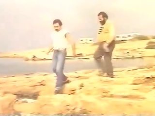 Klassiskt x topplista video- för provocerande adolescent på den seashore
