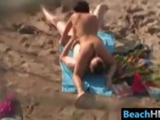 Couple Doing A 69 At The Beach